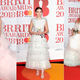 Illustration for article titled Inside the Dramatic Tulle Wars of the Brit Awards Red Carpet
